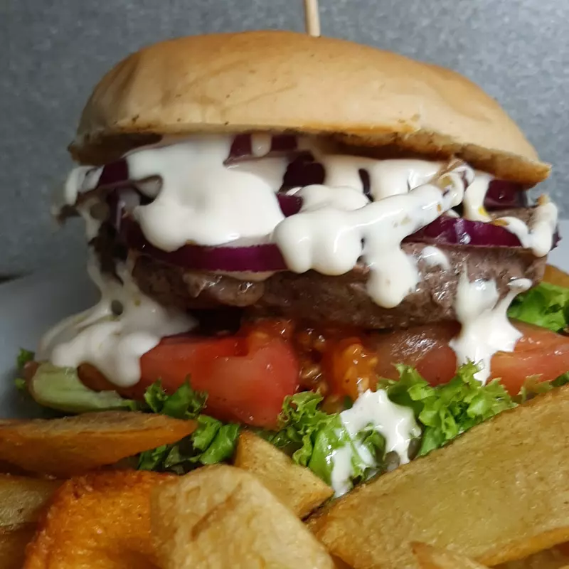 Hamburguesa de la casa $10.990