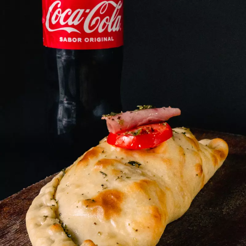 1 calzone gde. a elección + 1 coca