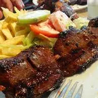 porcion  de anticuchos