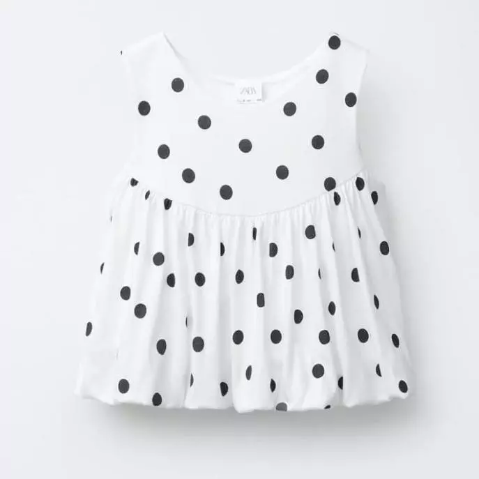 CAMISETA DE LUNARES CON GLOBO