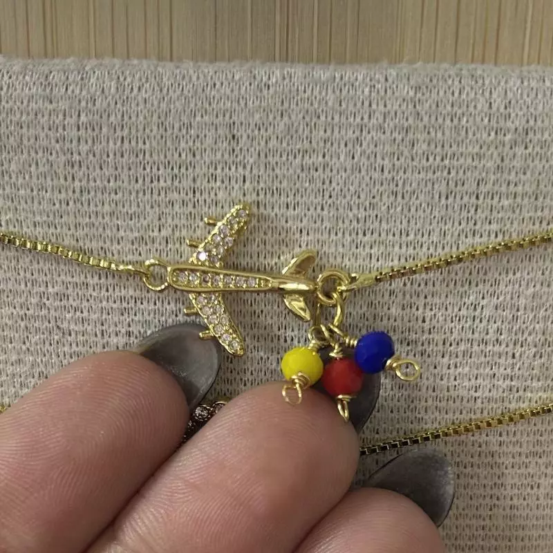 Pulsera avión tricolor