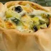 • Empanada de Rúcula y Jamón Crudo