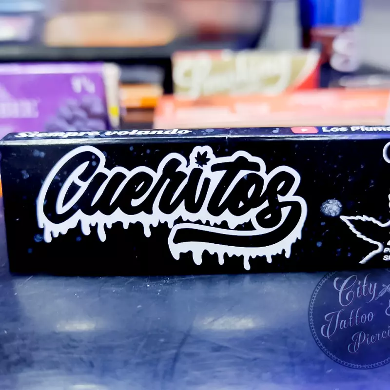 SMOKING PLUMA ROJA , NEGRO