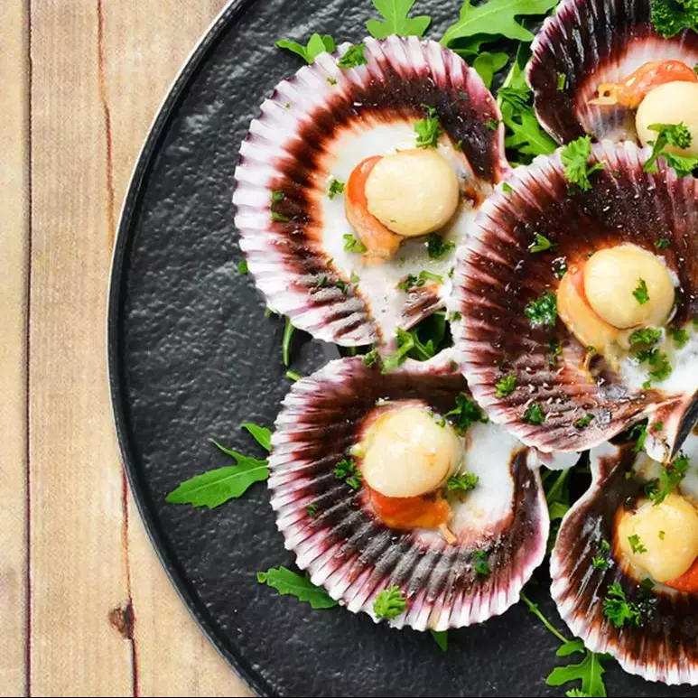 Ostiones en su concha