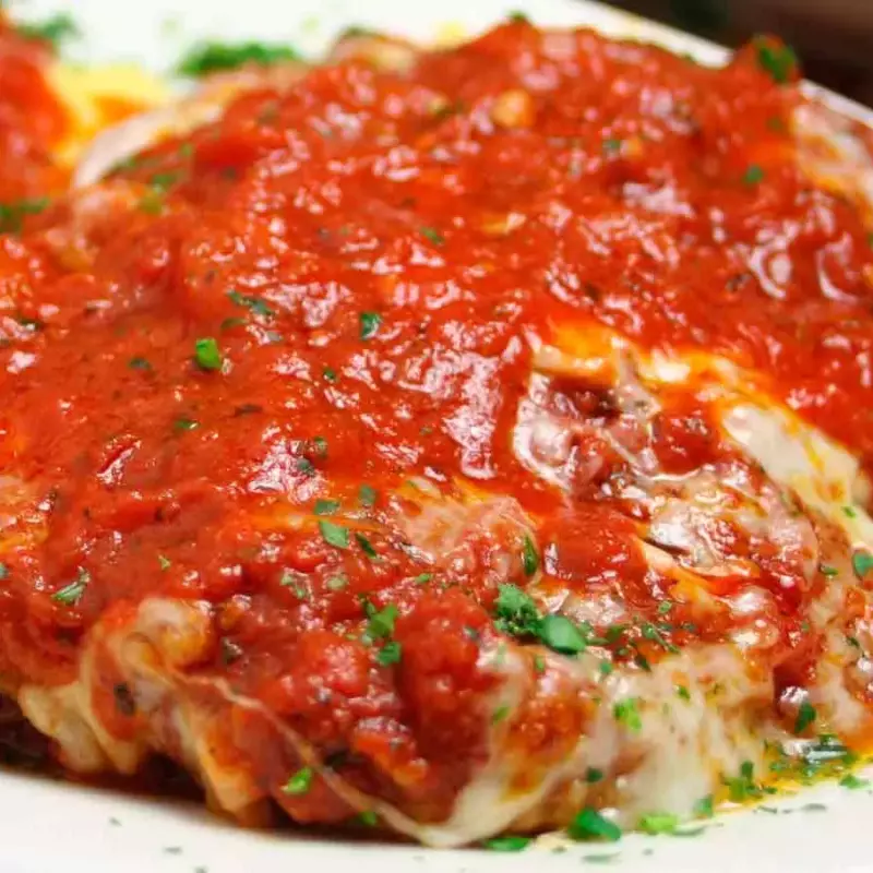 Filé de Frango a Parmegiana