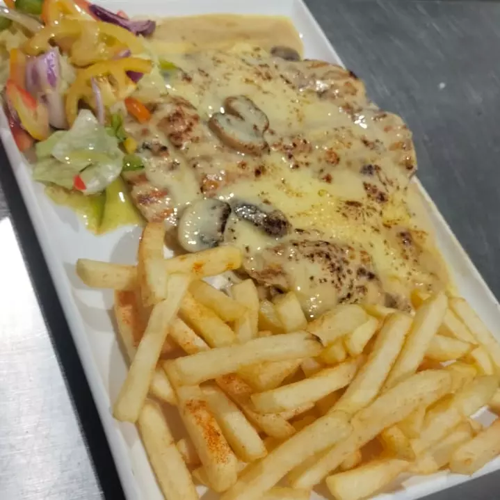 Pechuga gratinada con champiñones